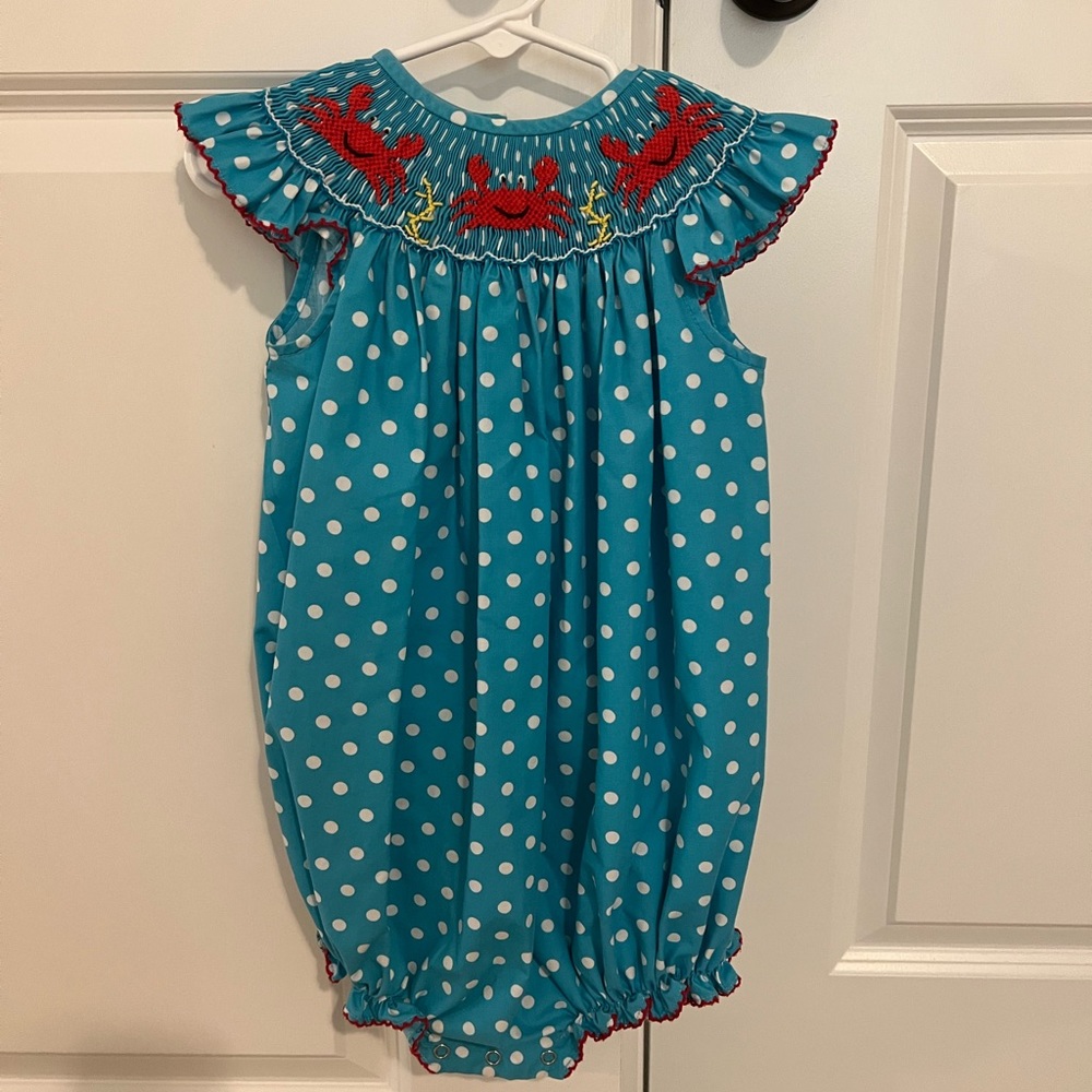 Smocked crab and polka dot bubble